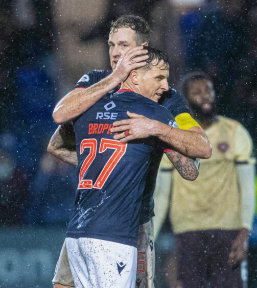 Ross County's Jordan White (left) celebrates with Eamonn Brophy at full-time after securing a late 2-2 SPFL Premiership draw with Hearts on Sunday at the Global Erergy Stadium, Dingwall. Josh Nisbet also scored in stoppage time for County after two James Wilson goals had Hearts leading 2-0. 