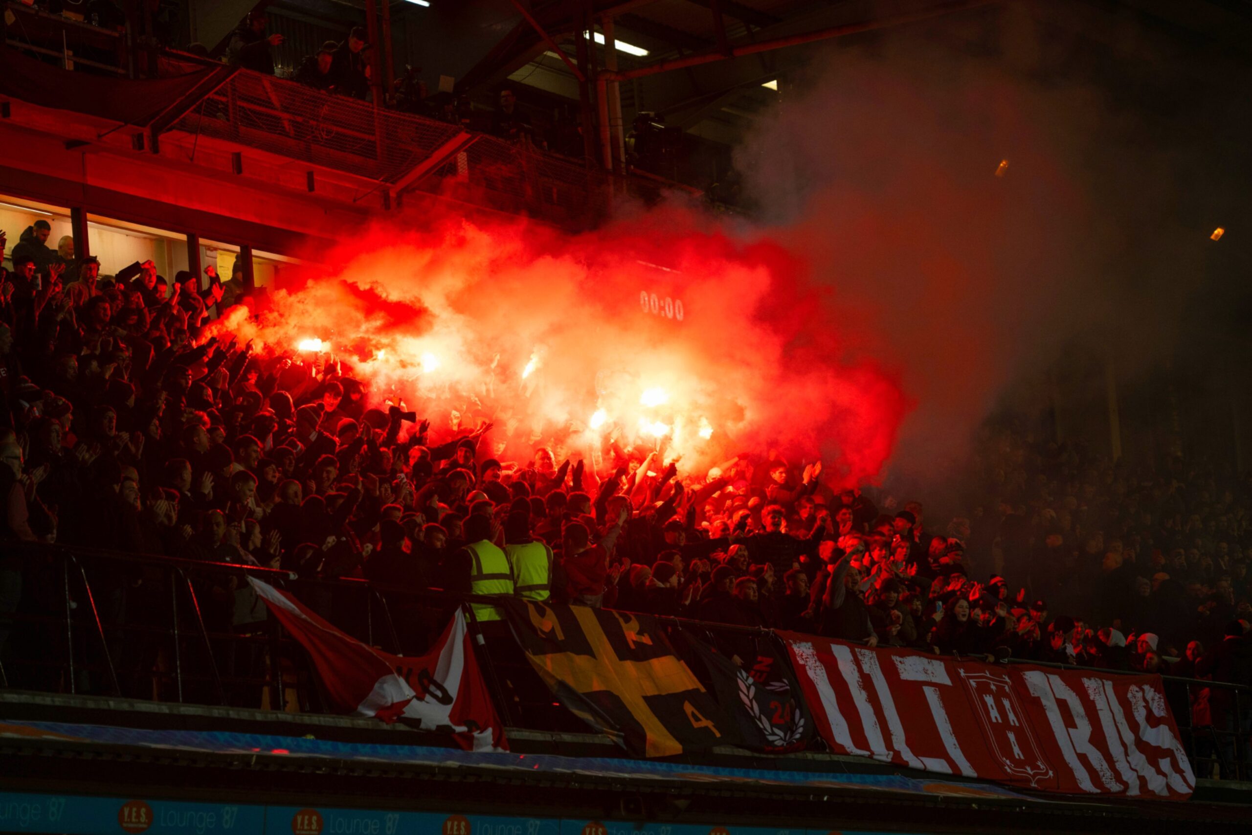 Aberdeen fans set off pyrotechnics during a Premiership match against Dundee United at Tannadice.