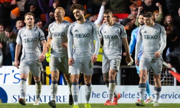 Aberdeen's Nicky Devlin, Sivert Heltne Nilsen, Dante Polvara, Slobodan Rubezic and Kevin Nisbet look dejected as Dundee United's Kevin Holt scores to make it 1-0 at Tannadice. Image: SNS