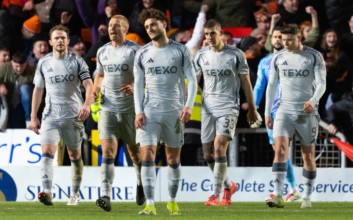  Aberdeen's Nicky Devlin, Sivert Heltne Nilsen, Dante Polvara, Slobodan Rubezic and Kevin Nisbet look dejected as Dundee United's Kevin Holt scores to make it 1-0 at Tannadice. Image: SNS 