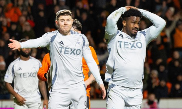 Aberdeen's Kevin Nisbet (L) and Duk look dejected during the 1-0 loss to Dundee United. Image: SNS