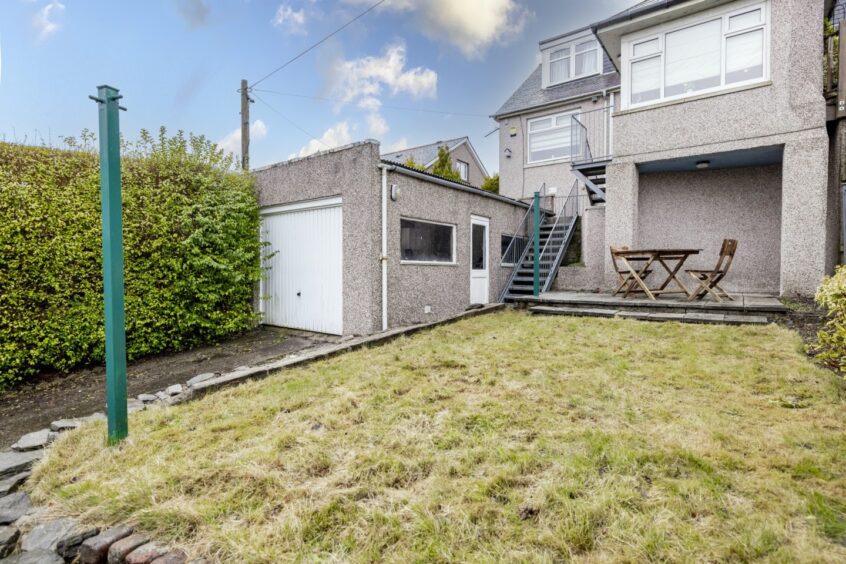 lawn and patio at this Mannofield property