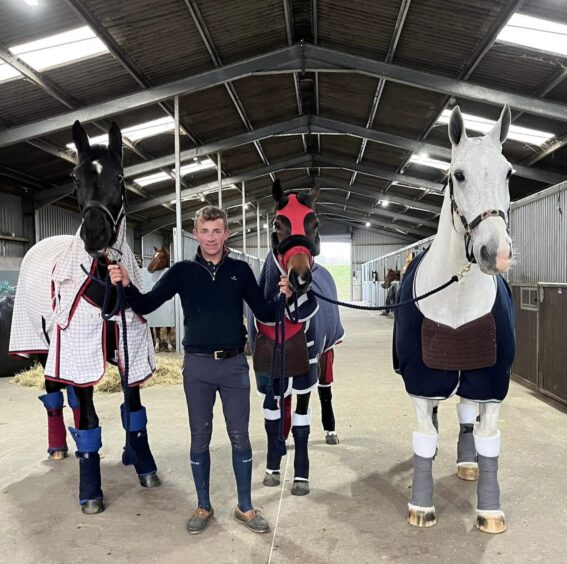 Hunter MacDonald with horses