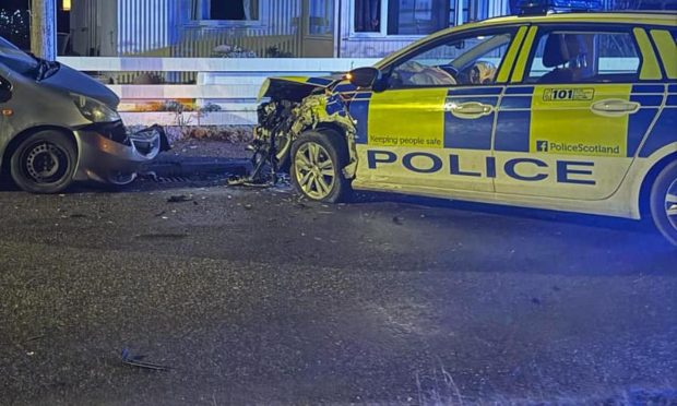 The police car has sustained heavy damage. Image: Fubar News