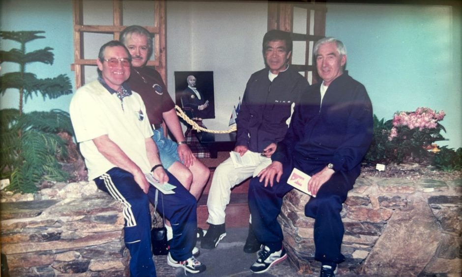 Sandy Simpson (front left) and Hirokazu Kanazawa (back right) at Fraserburgh Lighthouse Museum. Image: Supplied