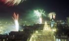 2000: Aberdeen saw in the New Year and new Millenium in style as crowds of people packed onto Union Street for the historic occasion while fireworks sparkled overhead. Image: DC Thomson