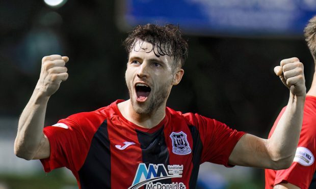 Ryan Sargent celebrates after scoring the winner for Elgin City against Kelty Hearts at Borough Briggs on Saturday, November 30, in the Scottish Cup.