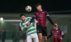 Buckie Thistle's Liam Harvey, left, and Milosz Ochmanski of Inverurie Locos jump for the ball.