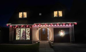 As this exterior photo shows, Matthew and Stephen's home is brightening up the dark winter nights