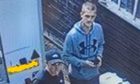 CCTV images of two men at the rear of a van.