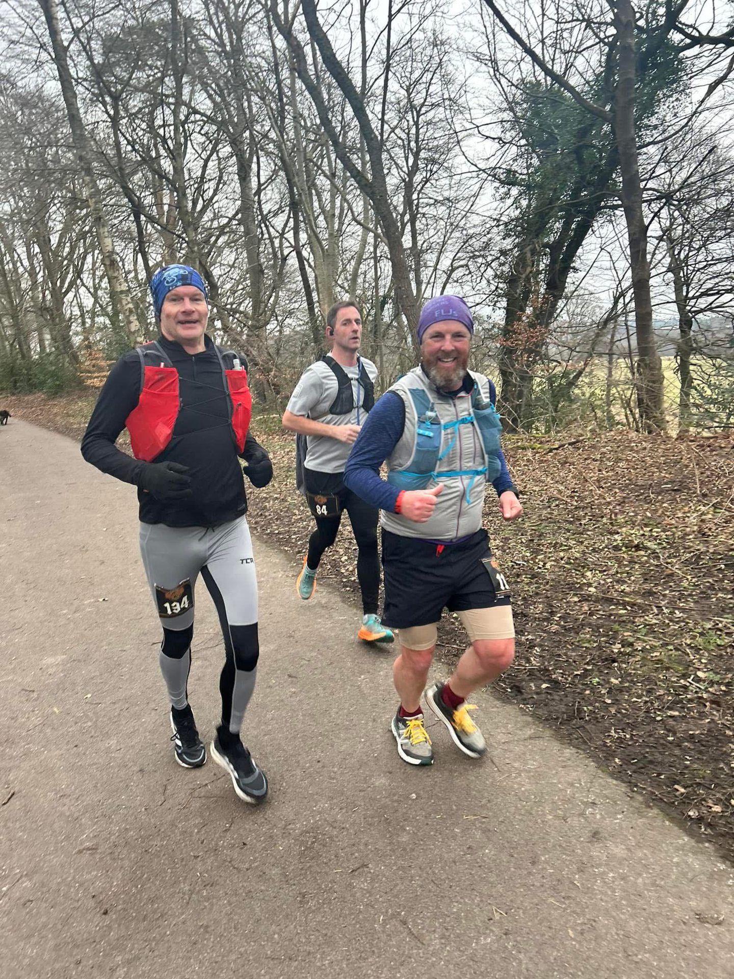 Three runners beside some trees during the D33 last year