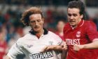 David Bowman, left, of Dundee United, up against Aberdeen's Theo Ten Caat at Pittodrie in November 1991.