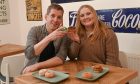 Food and drink journalist Joanna Bremner and Andy Morton try out doughnuts from Dough and Co. Image: Darrell Benns/DC Thomson