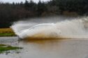 Drivers are facing delays and diversions due to flooding on roads across the north and north-east. Image: Kenny Elrick/DC Thomson