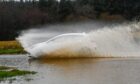 Drivers are facing delays and diversions due to flooding on roads across the north and north-east. Image: Kenny Elrick/DC Thomson