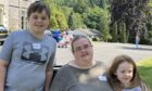 Aberdeen widow Diane Mackie who has died following cancer, shown with her two children.