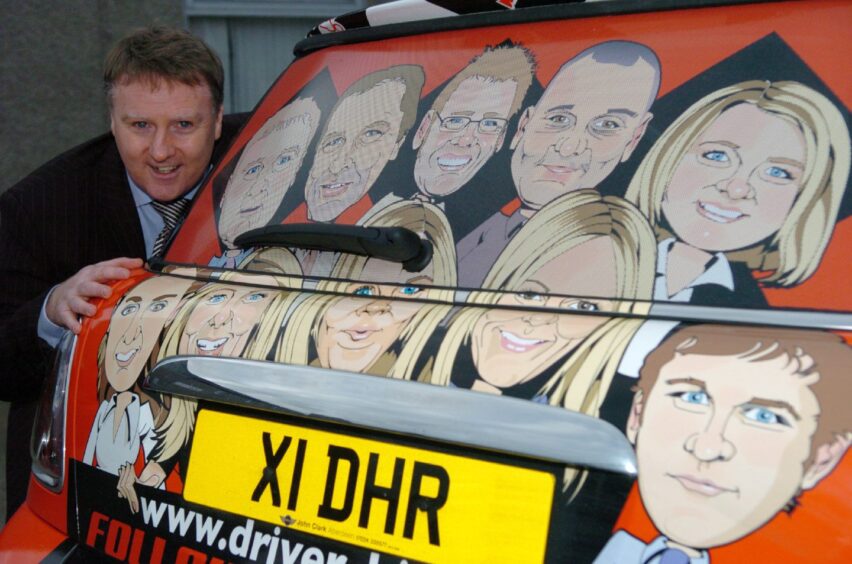 Stewart McKimmie with his customised Mini Cooper when he was working as a business development supervisor for Driver Hire Recruitment in 2007.