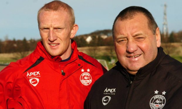 Former Aberdeen loan defender Dave Bus, left, with then-Aberdeen manager Jimmy Calderwood in 2008.