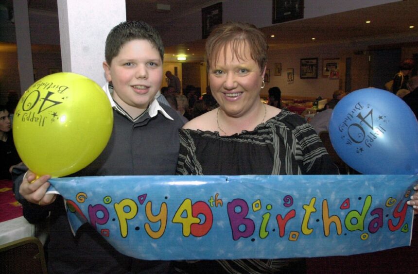 Martin celebrating his mum Lesley's 40th birthday back in 2002. Image: DC Thomson