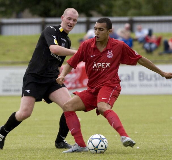 Othmane Hamama shields the ball in a trial game for Aberdeen at Elgin City in 2006.