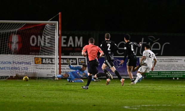 George Robesten, right, scores the winning goal for Brora Rangers against Formartine United in the Breedon Highland League. Pictures by Darrell Benns/DCT Media.