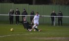 Brora Rangers' Alex Cooper, right, tries to cross under pressure from Tyler Mykyta of Formartine United. Pictures by Darrell Benns/DCT Media.