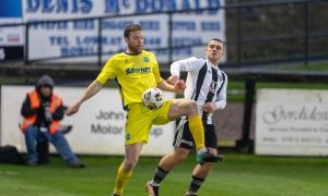 Buckie's Hamish Munro, left, controls the ball with his midriff under pressure from Fraserburgh's Scott Barbour