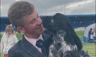 Hunter MacDonald of Contin, Ross-shire with his dog Travis.