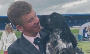 Hunter MacDonald of Contin, Ross-shire with his dog Travis.