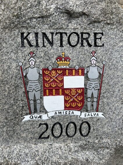 The Kintore Millennium stone freshly painted.