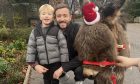 Miracle was recently a special guest at Simpsons Garden Centre in Mintlaw, where he posed for pictures with customers including Alex (L) and Adam (R) from Ellon. Image: DC Thomson