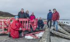 Members of the community have gathered to raise awareness of the damage at West Beach. Image: Jason Hedges/DC Thomson.