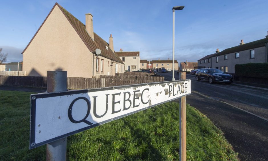 Quebec Place street sign. 