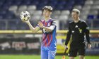 Inverness Caledonian Thistle left-back Matthew Strachan prepares to take a throw-in during his team's 2-0 League One defeat against Arbroath.