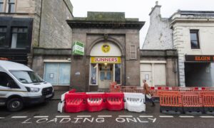 Former Junners store with the listed arch. Image: Jason Hedges/DC Thomson