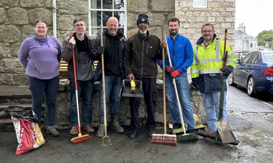 Jim Reid with fellow volunteers sprucing up Kintore.