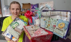 Laura Henderson from Just a Wee Gift with some of her products. Image: Kenny Elrick/DC Thomson