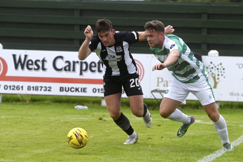 Jack Murray, left, in action for Elgin City against Buckie's Josh Peters in Shaun Wood's testimonial match in July 2024 at Victoria Park, Buckie. 