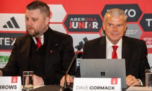 Chief executive Alan Burrows (l) and Chairman Dave Cormack seated at the AGM at Pittodrie.