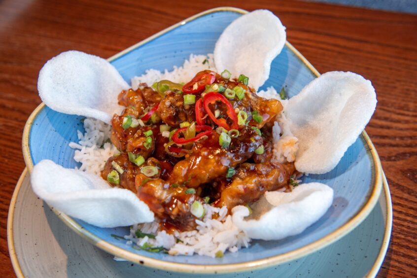 Crispy chilli beef with coconut sticky rice and prawn crackers 