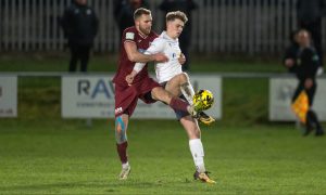 Ryan Robertson, left, in action for Keith.