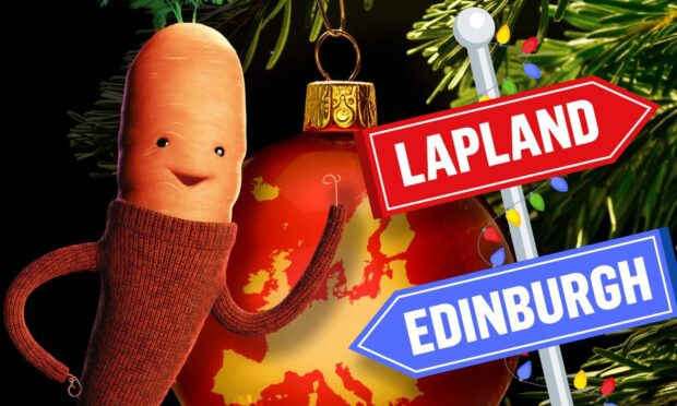 Aldi's Kevin the Carrot next to signs for Edinburgh and Lapland.