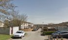 Cars parked on Middle Brae in Bucksburn.