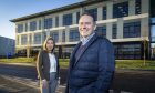 OEG office manager Toto Sanderson and CEO John Heiton outside the firms new HQ in Dyce. Image: Big Partnership