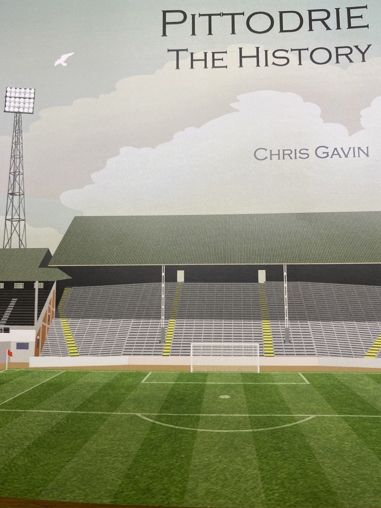 The front cover of Chris Gavin's new book, called Pittodrie: The History, which features a drawing of the stand, pitch and floodlights