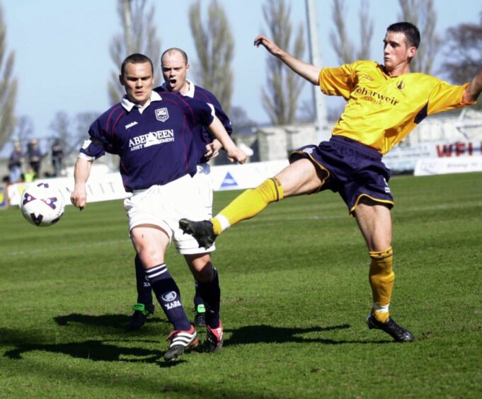 Kenny Gilbert in action for Ross County in September 2000 against Falkirk, supported by team-mate and now Staggies chief executive Steven Ferguson.