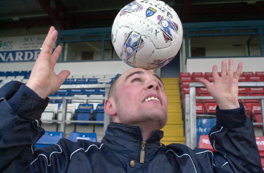 Kenny Gilbert was given the all clear for heading the ball in January 2002. The former Ross County midfielder is pictured here with the ball balanced on his forehead at Victoria Park, Stadium, Dingwall. 