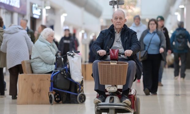 Julian Cox says a funding cut to the  Shopmobility charity is incomprehensible. Image Sandy McCook/DC Thomson