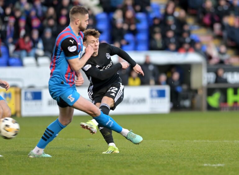 Winger Adam Emslie has a shot at goal for Cove Rangers against Inverness Caledonian Thistle in his team's 4-1 SPFL League One win at the Caledonian Stadium on December 28, 2024.