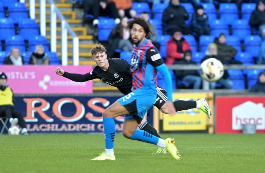 Adam Emslie gets a cross in for Cove Rangers past Remi Savage of Caley Thistle. Image: Sandy McCook/DC Thomson